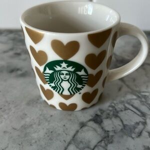 Espresso Starbucks cup. Gold hearts.